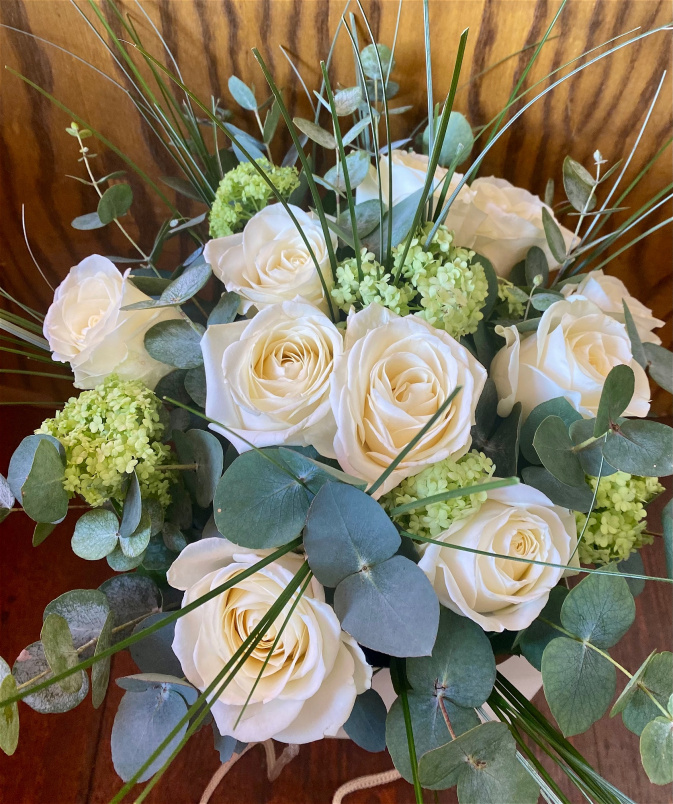 Weddings | Brides bouquet roses and eucliptus wild